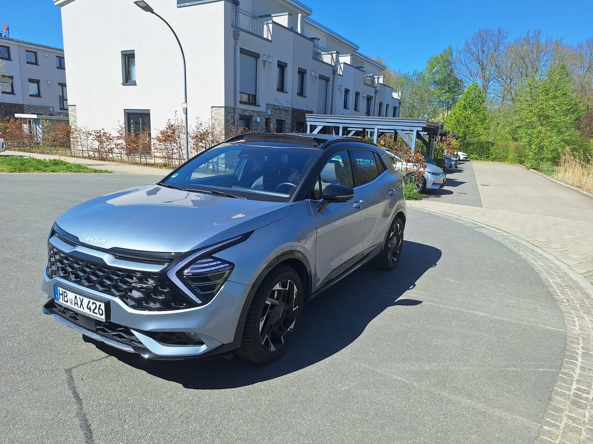Kia Sportage Premium des Care Fahrdienst Bremen – Seiten/Front Urban